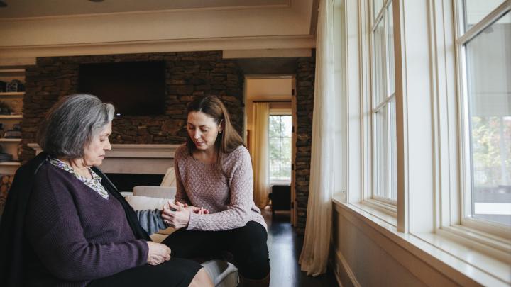 An image of a Family Caregiver Checking Pulse