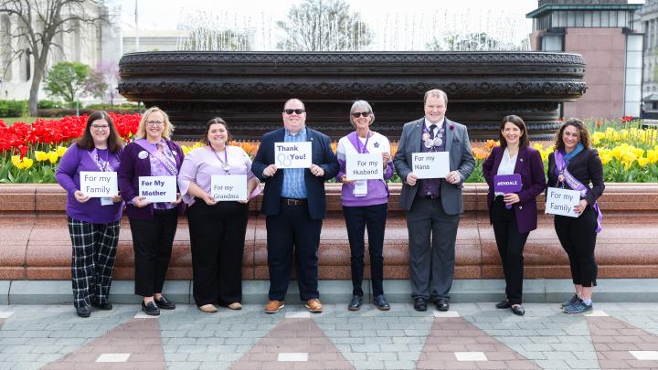 Advocates with signs