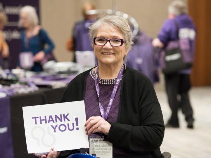 White Woman with Thank You Sign