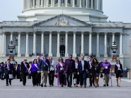 group walking in front of capitol